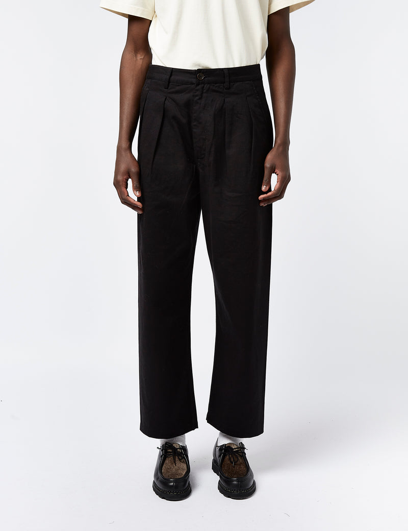 Loose Fit Tailored twill trousers - Black - Men | H&M IN